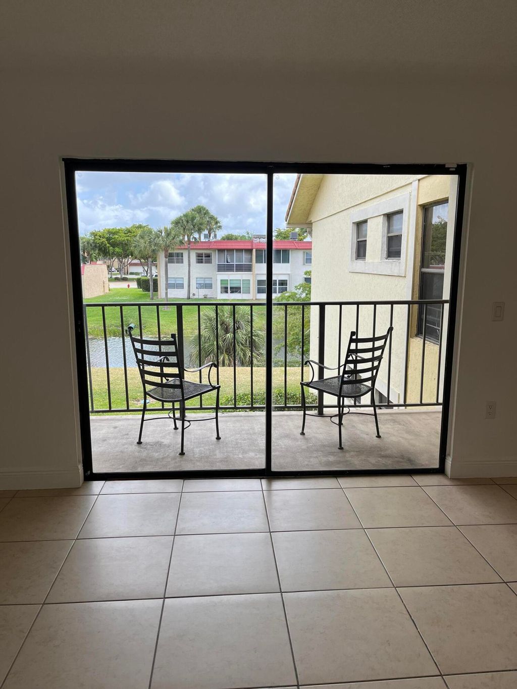 Photo of 1522 Lake Crystal Drive #E, West Palm Beach, FL 33411 (MLS # R11141636)