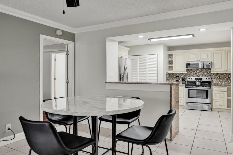 Beautifully Renovated First-Floor Condo in Prime Location!  Move right into this updated 3-bedroom, 2-bathroom first-floor unit featuring a modern kitchen with granite countertops, stainless steel appliances, and a smart, open layout. Enjoy wood flooring in the bedrooms and tile throughout the main living areas.  Located in a desirable community within a top-rated school district, just minutes from the Sawgrass Expressway, shopping, dining, and a world-class aquatic complex.  Well-maintained, move-in ready. No FHA.  Schedule your showing today—this one won't last!