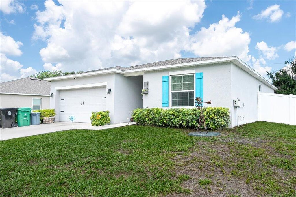 Photo of 2050 SW Cycle Street, Port Saint Lucie, FL 34953 (MLS # R11000468)