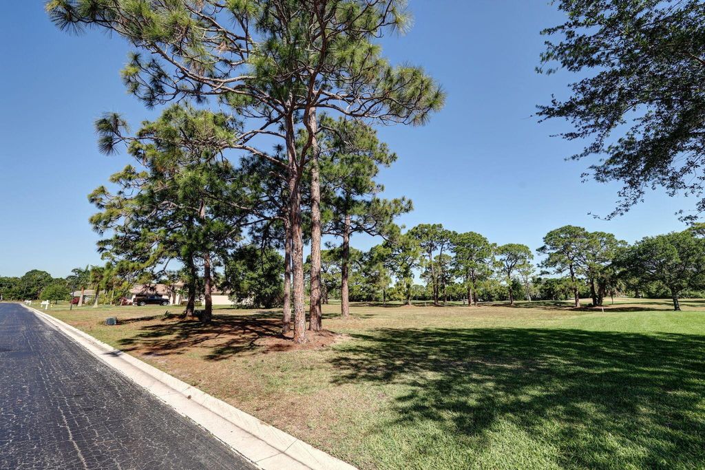 Photo of 9620 Knollwood Lane, Fort Pierce, FL 34951 (MLS # R10974331)