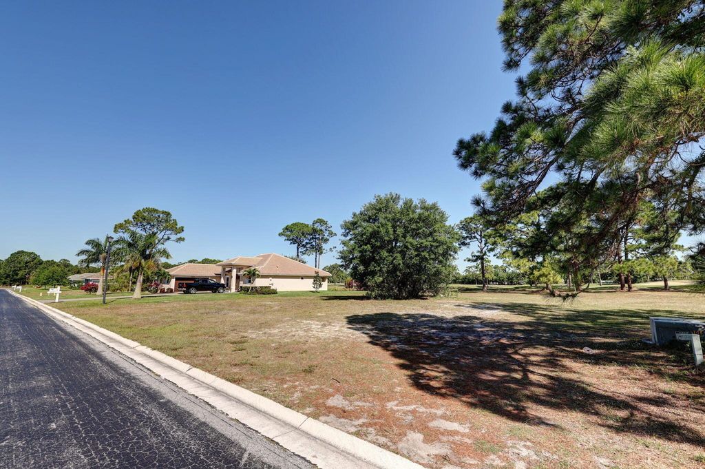 Photo of 9620 Knollwood Lane, Fort Pierce, FL 34951 (MLS # R10974331)