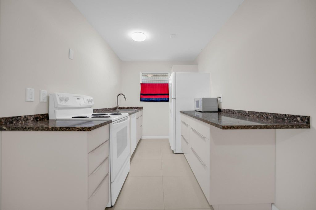 Photo of 1105 N Oakridge Circle #C, Lake Worth, FL 33462 (MLS # R11113583)