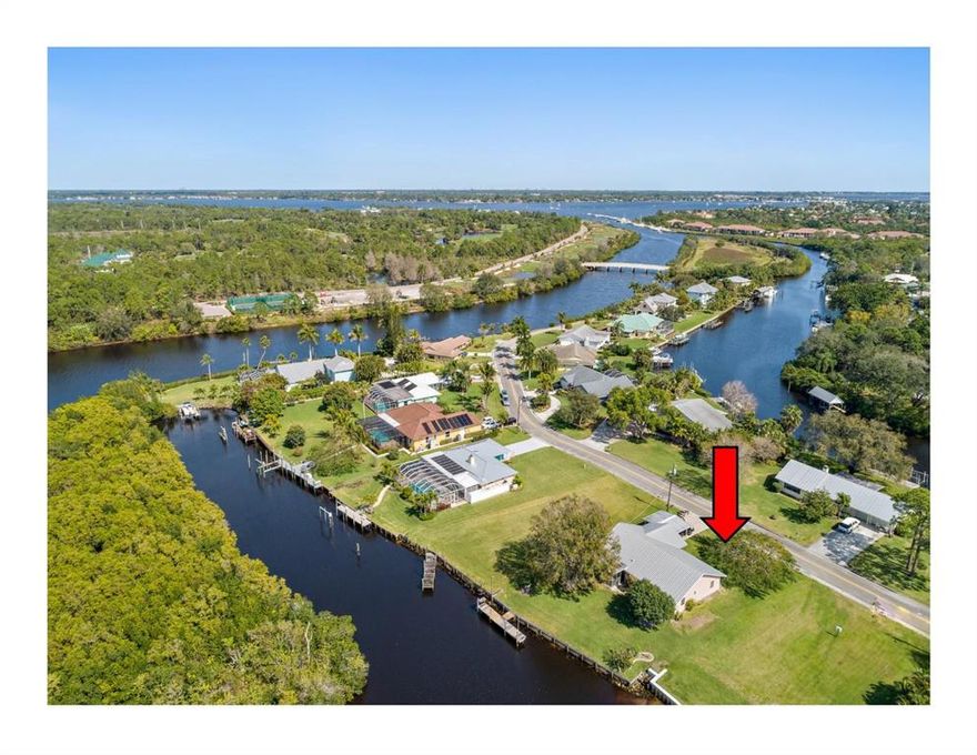 Boaters Paradise! One of only a few lots in Hidden River  that offers a private  wide water view ,  no neighbor behind you. Direct ocean access with no fixed bridge. 90 ft of water frontage. and Dock.   2 bedroom 2 bath , 1 car garage and  2 car port.  Walk in Closet in Master Bedroom .  New AC 2018,  Large inside Laundry/utility room. 1632 sq ft of living area. Family room and screened patio . Metal roof,  Hurricane Panels.  Original kitchen and baths.  Concrete construction.  Tons of potential and room to expand. Large back yard with stunning views of bird sanctuary and the water.  No HOA or restrictions.