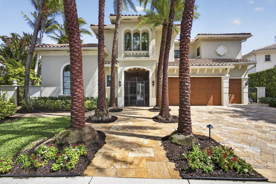 Discover this Remarkable Gem with Courtyard Pool Home with Guest House, Stunning Front and Back Lake Views, Grand Architectural Details, High Ceilings, Marble Flooring, Family Room with Custom Stone Fireplace, Custom Gourmet Kitchen with Island, Airy Breakfast Room, Game Room, Movie Theatre, Smart Home Integration, Formal Living Room, Formal Dining Room, Office with Outdoor Fountain, Lavish Primary Suite with Custom Designed Walk In Closets, Luxury Primary Spa Bathroom with Spa Tub, Separate Shower, Bidet, Impact Windows, Whole House Generator, Stunning Courtyard Pool - Heated with Jets, Home Features Summer Kitchen, Sparkling Saltwater Pool, Designed for Entertaining, The Ultimate Florida Lifestyle Oasis, Lush Landscaping, Oversized Corner Lot, Don't Miss This One