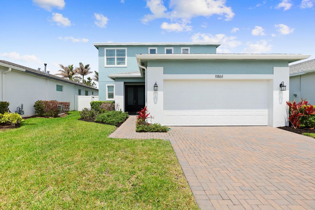 Photo of 11861 SW Lyra Drive, Port Saint Lucie, FL 34987 (MLS # B26018802)