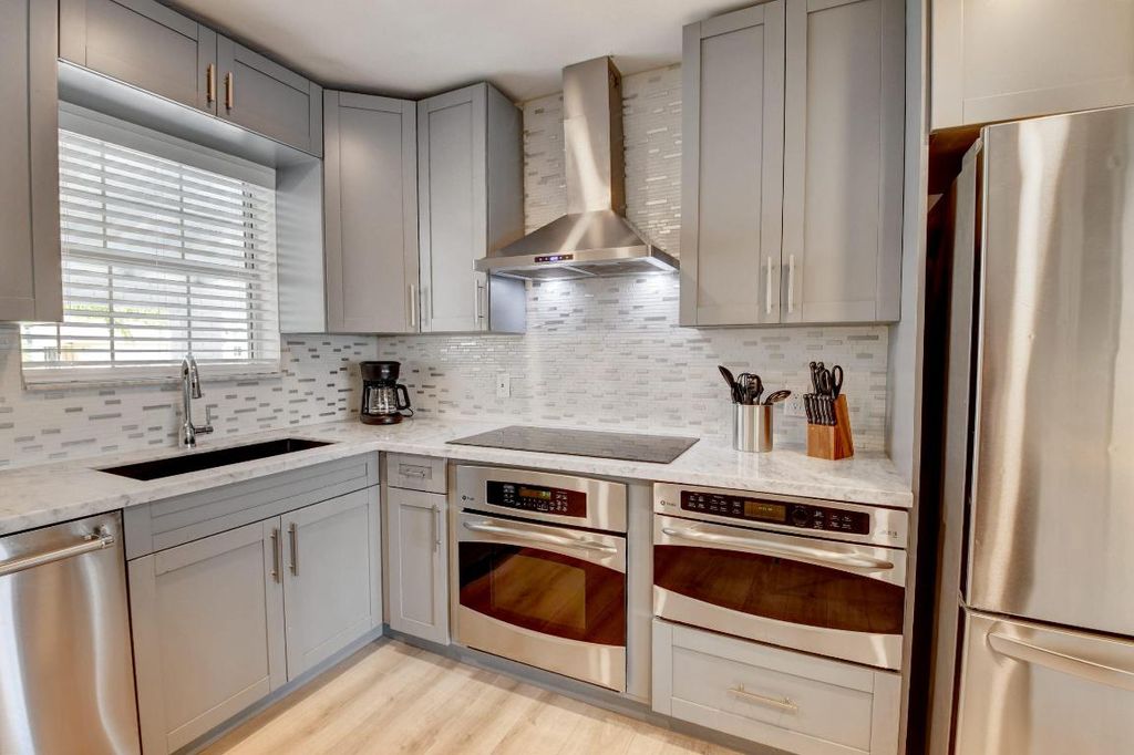 Photo of 400 NE 45th Street, Boca Raton, FL 33431 (MLS # R11093070)