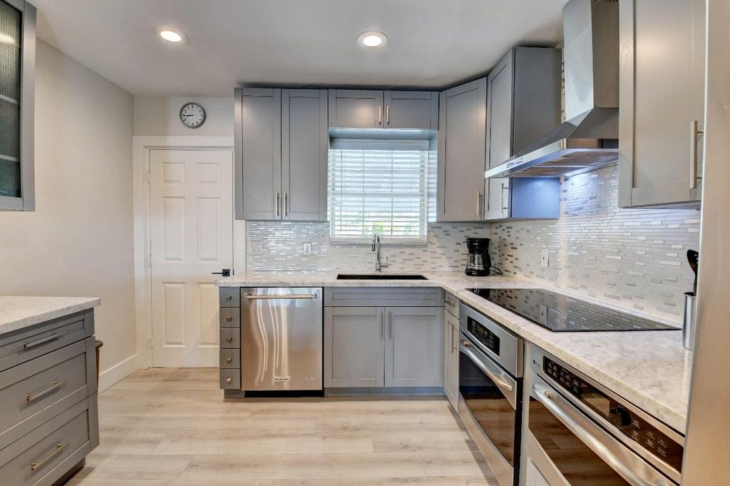 Photo of 400 NE 45th Street, Boca Raton, FL 33431 (MLS # R11093070)