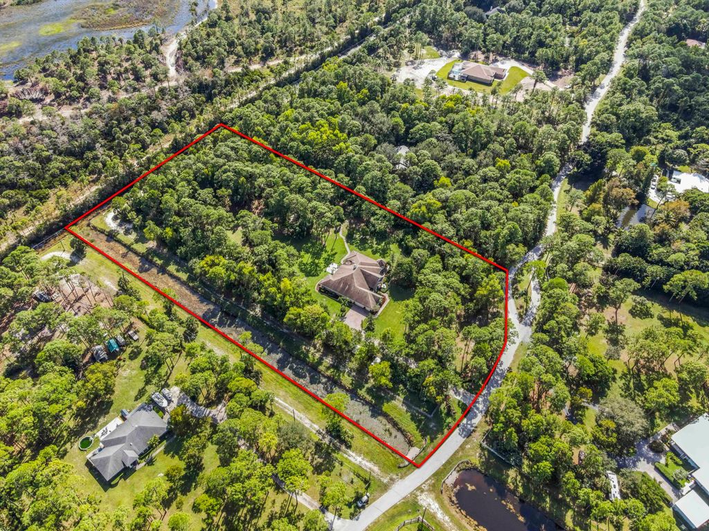 Photo of 13418 Sand Ridge Road, West Palm Beach, FL 33418 (MLS # R11140458)