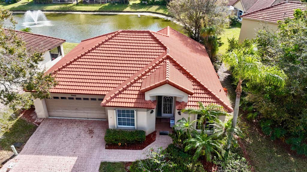 Photo of 7043 Galleon Cove, Riviera Beach, FL 33418 (MLS # R11051487)