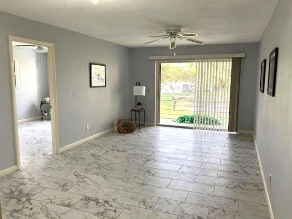 Photo of 317 Lake Evelyn Drive, West Palm Beach, FL 33411 (MLS # F10539871)