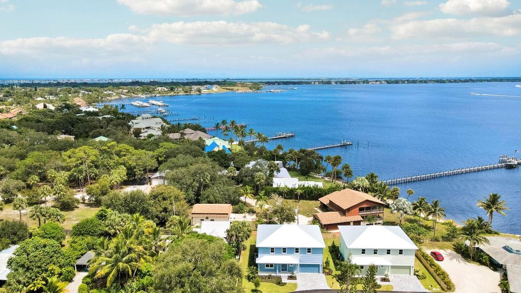 Photo of 1023 NE Orange Avenue, Jensen Beach, FL 34957 (MLS # R11145334)