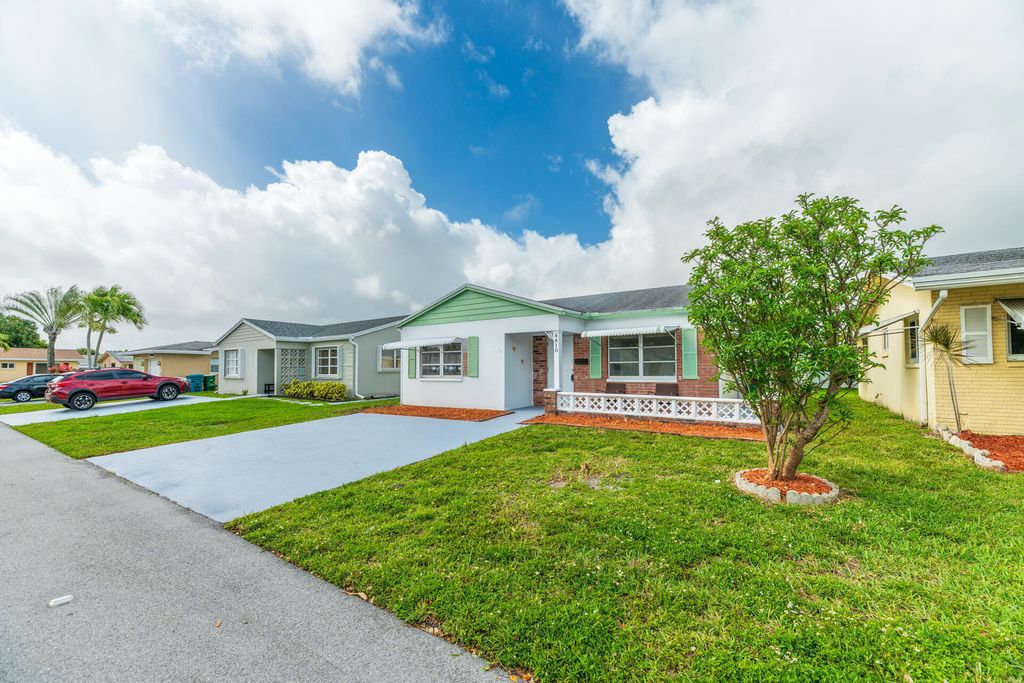 Photo of 4810 NW 49th Drive, Tamarac, FL 33319 (MLS # B26010773)