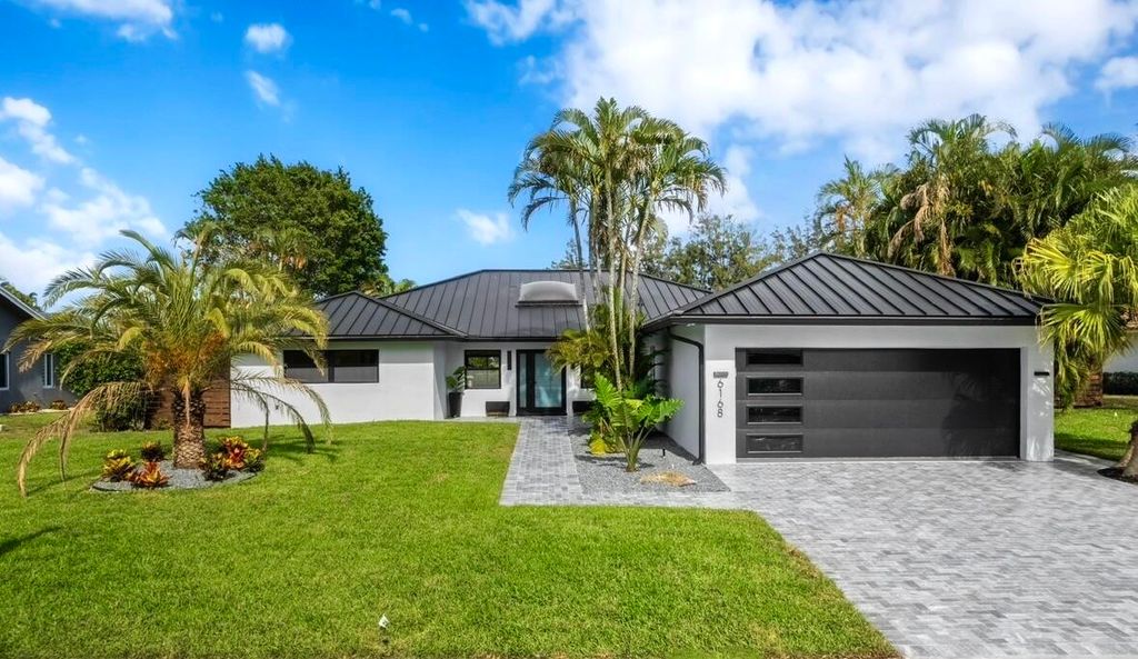 Photo of 6168 NW 4th Avenue, Boca Raton, FL 33487 (MLS # R11099349)