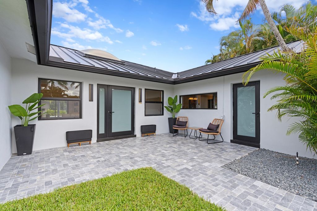 Photo of 6168 NW 4th Avenue, Boca Raton, FL 33487 (MLS # R11099349)