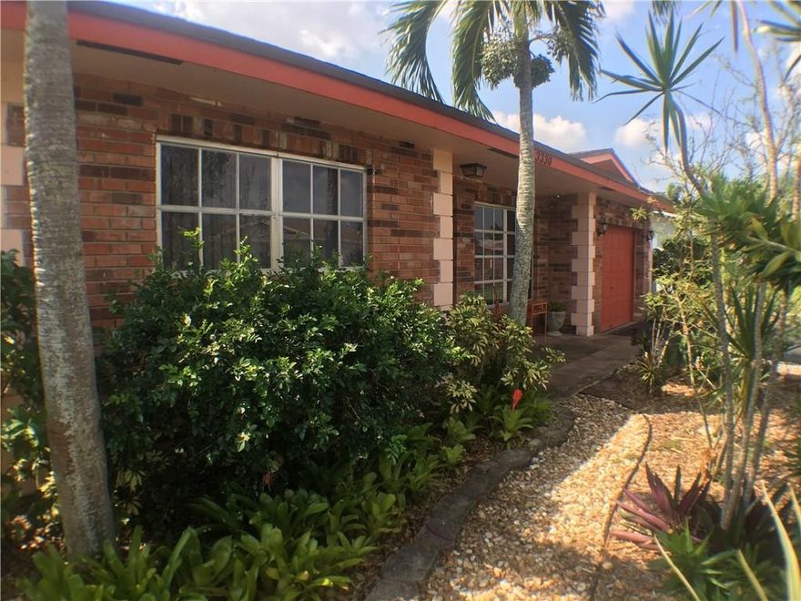 UPDATED HOME WITH OPEN FLOOR PLAN, LOVELY KITCHEN, 2 UPDATED BATHROOMS, TILE FLOORS.  HUGE FAMILY ROOM WITH SLIDING GLASS DOORS LEADING OUT TO PATIO. LOVELY TROPICAL LANDSCAPING. SPACIOUS UPDATED MASTER BATHROOM, BRAND NEW ROOF (2017), HURRICANE RESISTANT FRONT DOOR, SHUTTERS FOR SLIDERS IN BACK ONLY, NEWER A/C (2011) & HOTWATER HEATER (2011) , WASHER AND DRYER, THIS HOME HAVE BEEN MAINTAINED & IS MOVE IN READY.  PLENTY OF ROOM FOR ENTERTAINING FRIENDS & FAMILY-YOU WON'T BE DISAPPOINTED!