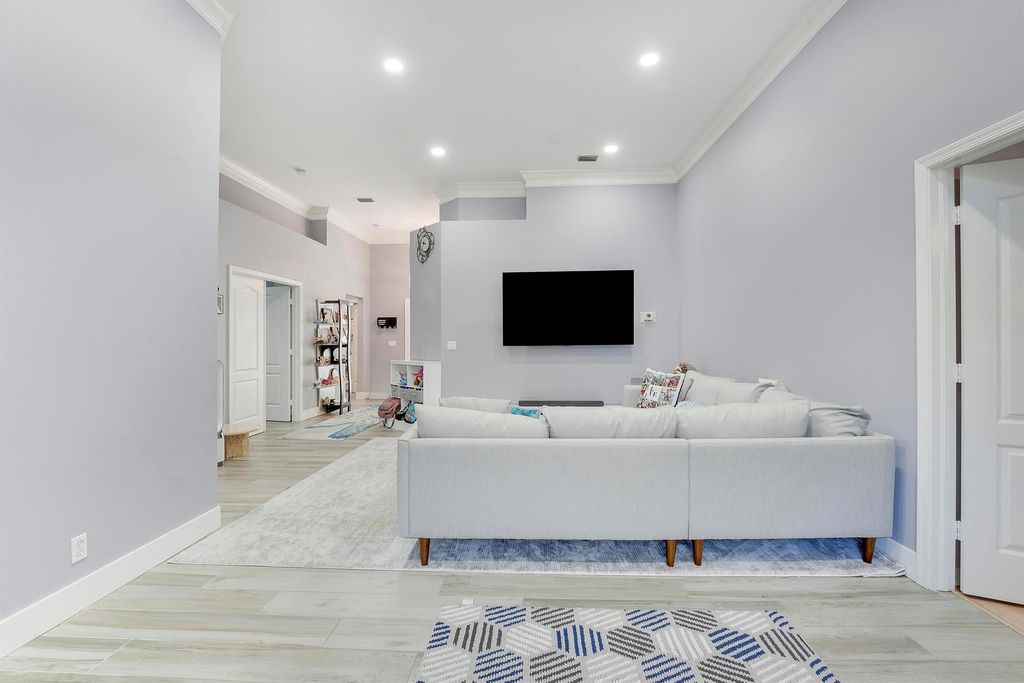 Photo of 496 Peacock Lane N, Jupiter, FL 33458 (MLS # R11100278)