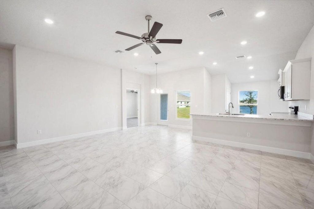 Photo of 8627 Giovanni Avenue, Fort Pierce, FL 34951 (MLS # R11150201)