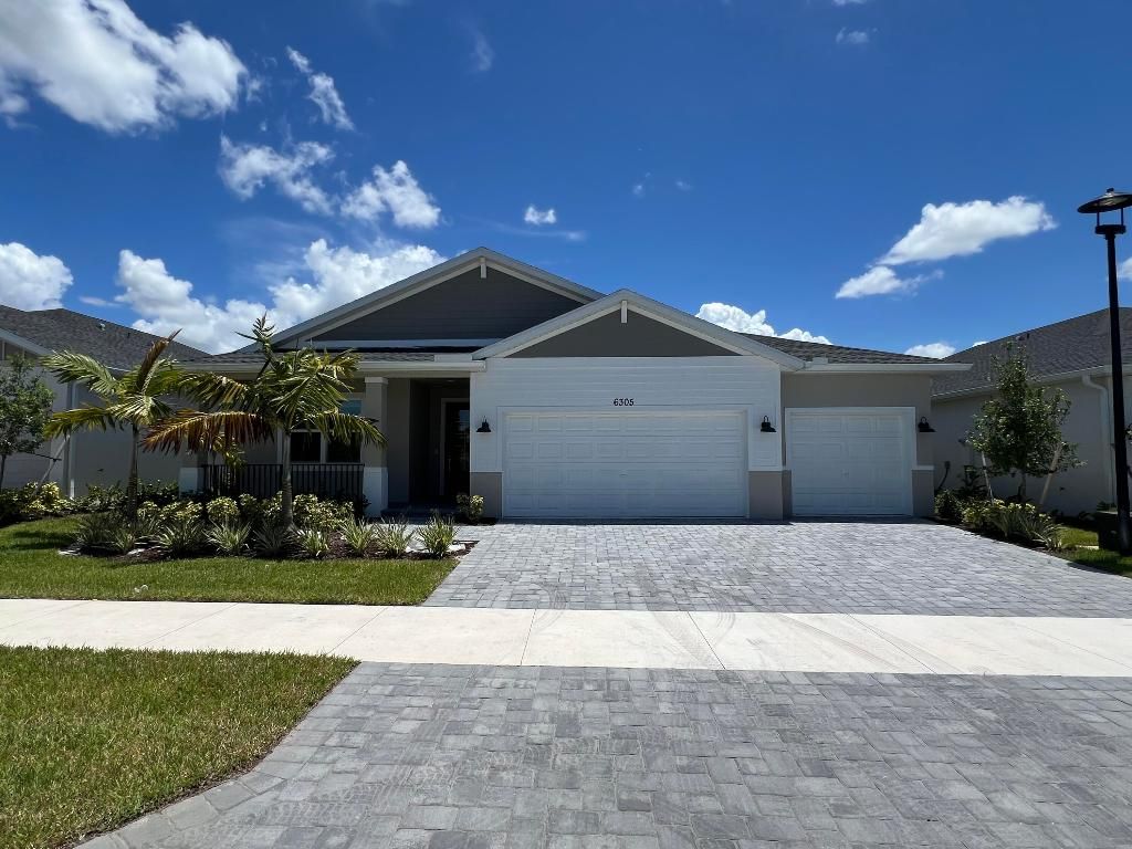 Photo of 6305 NW Cloverdale Avenue, Port Saint Lucie, FL 34987 (MLS # R11150772)