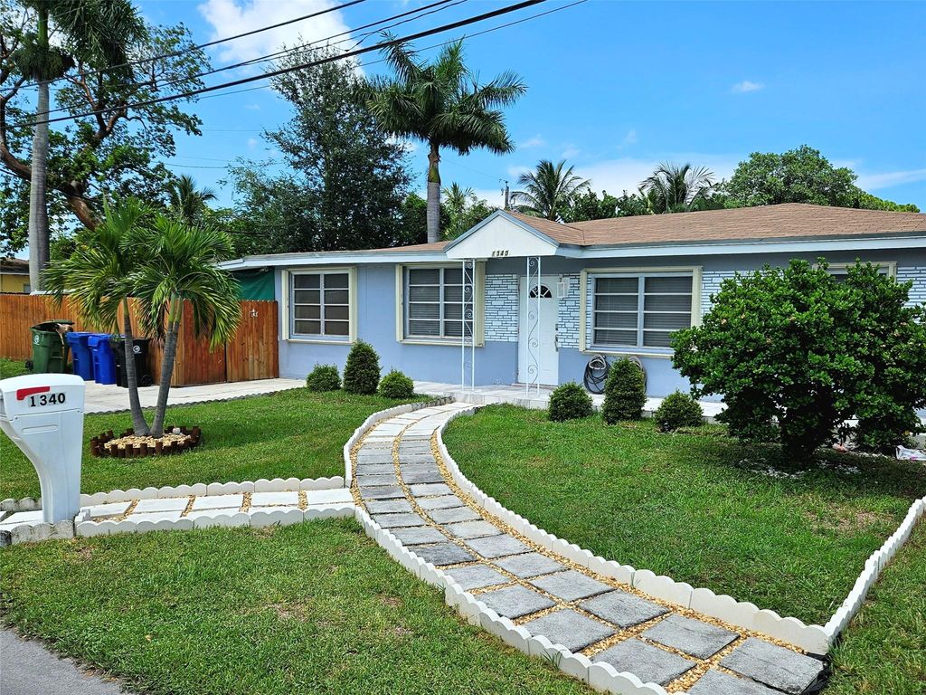 Photo of 1340 SW 32nd Ave, Fort Lauderdale, FL 33312 (MLS # F10533093)