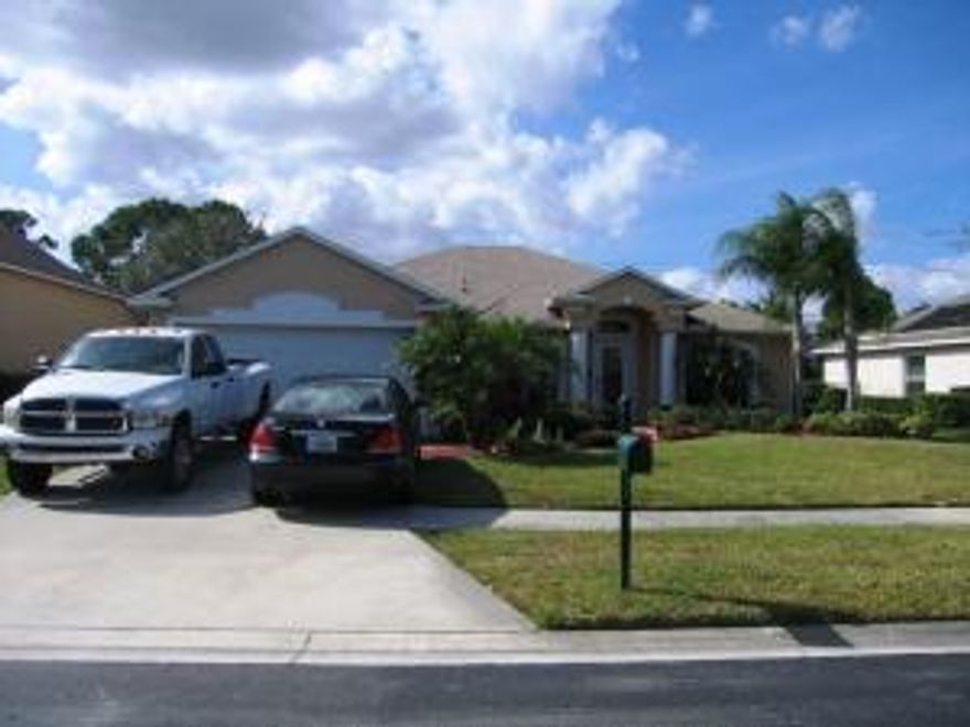 Roomy 4/2/2 in desirable gated community of Sawgrass Lakes. This is a Mercedes built home with recently updated kitchen, den and dining room. Features include stainless appliances, HVAC air filtration system, and huge fenced in backyard, HOA of just $335/qtr includes lawn irrigation, and basic cable with free HBO. Minutes to Tradition, local dining, shopping, entertainment, schools, and I95.