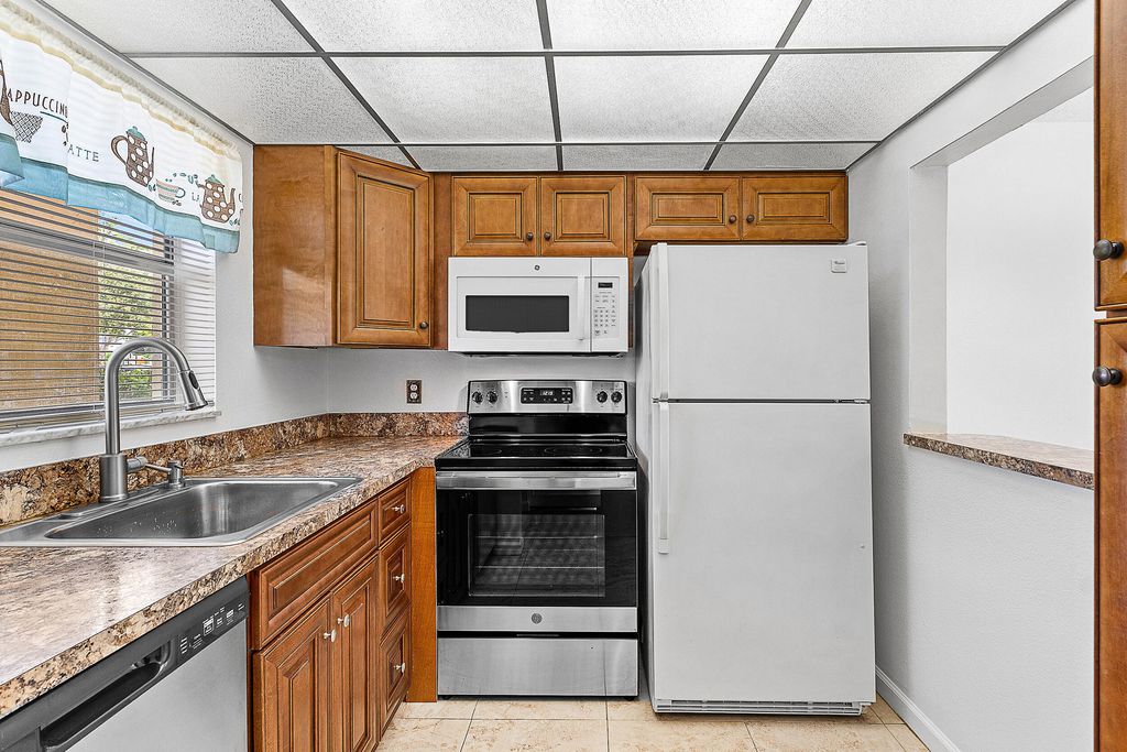 Photo of 9855 Sandalfoot Boulevard #305, Boca Raton, FL 33428 (MLS # B26025263)