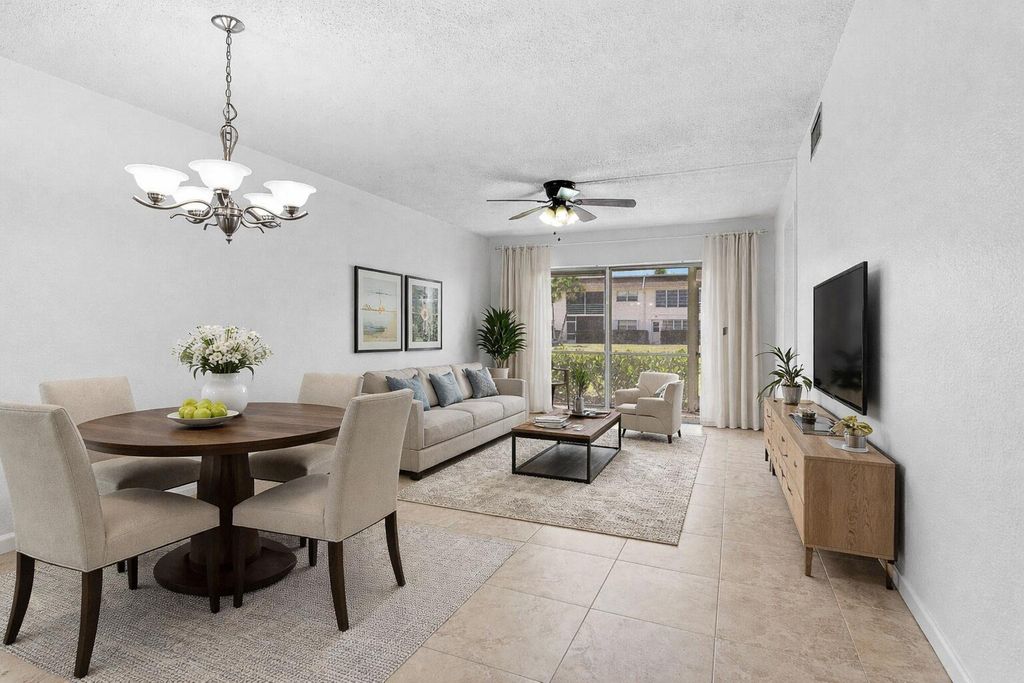 Photo of 9855 Sandalfoot Boulevard #305, Boca Raton, FL 33428 (MLS # B26025263)