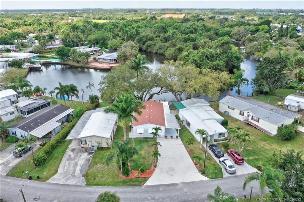 Photo of 7620 SE Fork River Drive, Stuart, FL 34997 (MLS # R11161822)