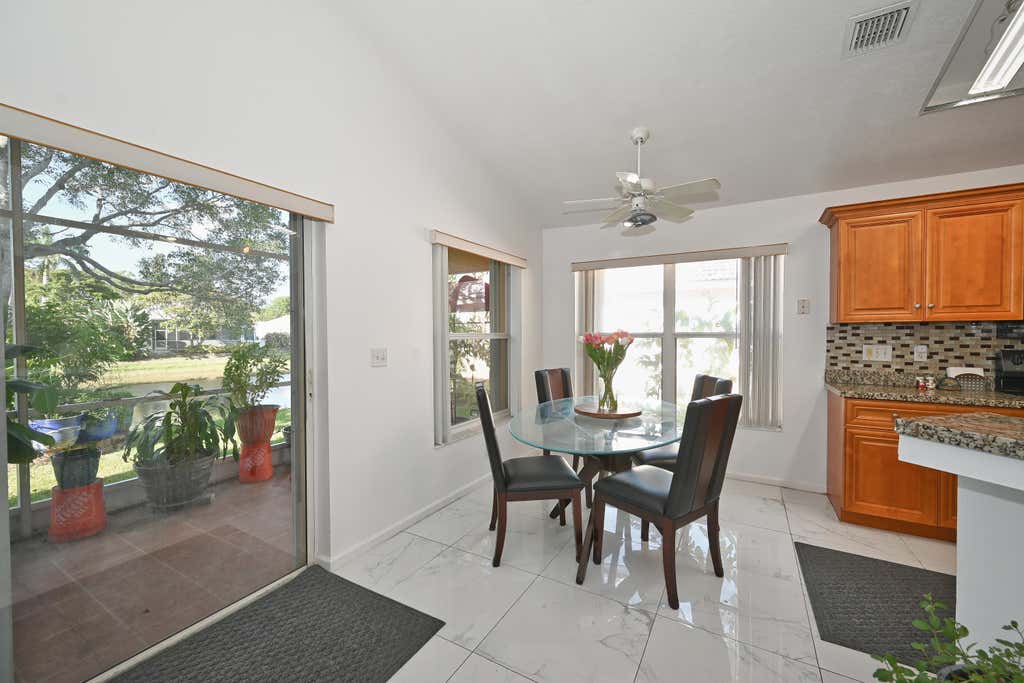 Photo of 2505 EGRET LAKE Drive, Greenacres, FL 33413 (MLS # B26067463)