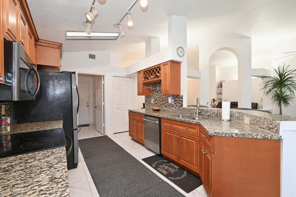 Photo of 2505 EGRET LAKE Drive, Greenacres, FL 33413 (MLS # B26067463)