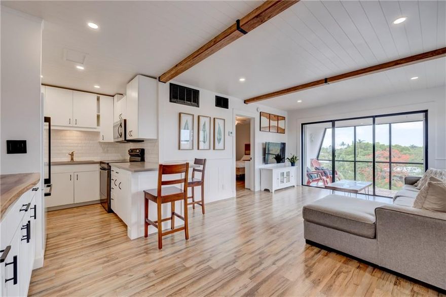 Stunning 1 bedroom 1 bathroom corner unit with amazing views of waterway and Fort Lauderdale Skyline. Comes furnished and is perfect for any investor or buyer looking to make this home. Can be rented immediately. New appliances, flooring, and has washer and dryer in unit. Boat dockage available for free. Water, trash, cable, internet, and extra storage included in HOA. Gated community with pool, clubhouse, BBQ area, boat trailer parking and car wash area.