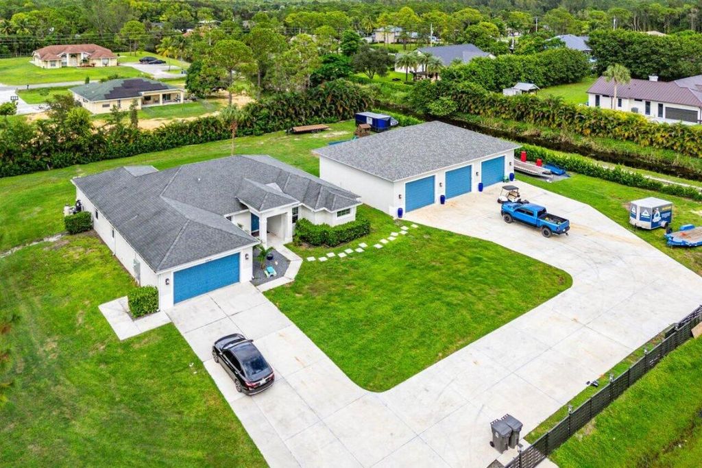 Photo of 12291 70th Place N, The Acreage, FL 33412 (MLS # R11152291)