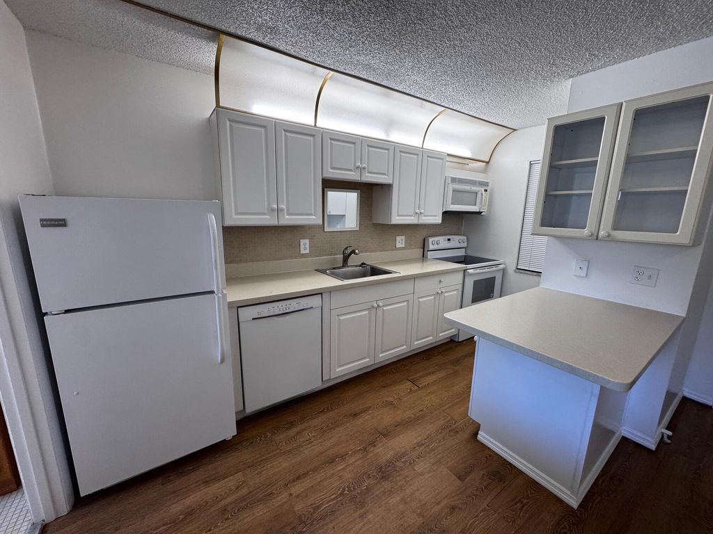 Photo of 1021 SE Monterey Road #1-43, Stuart, FL 34994 (MLS # B26009309)