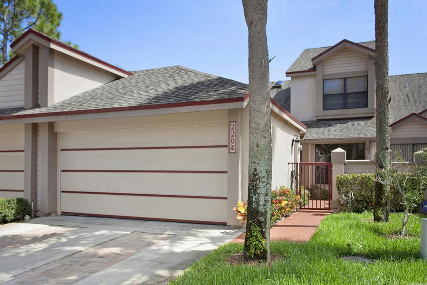 Immaculate 2 story townhouse 3 bedroom, 2.5 bath, 2 car garage with open loft offering serene water views & elegant fountain. Amenities include: Updated kitchen w/ cherry wood cabinets, granite counters, decorative backsplash, stainless steel appliances, under mount sink, 24'' ceramic tile on main floor, tiled master bedroom suite downstairs w/updated bath and walk in closet. Crown molding throughout, updated 2nd bathroom vanity sink, open loft with built in cabinets for storage, custom Adorne light switches, freshly painted with newer window treatments. Enjoy your evenings overlooking the water from a spacious patio deck. Great for entertaining! 24hr Gated community, clubhouse, tennis, fitness room, 3 pools, basketball, Bocci,playground and Jogging