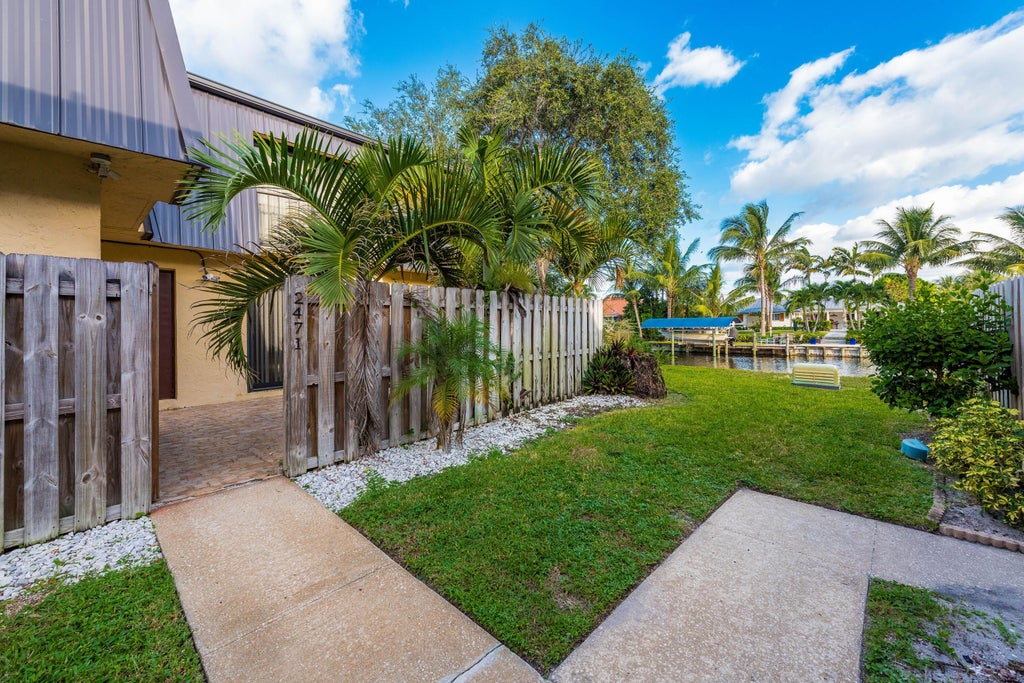 Photo of 2471 Waterside Drive, Lake Worth, FL 33461 (MLS # B26046585)