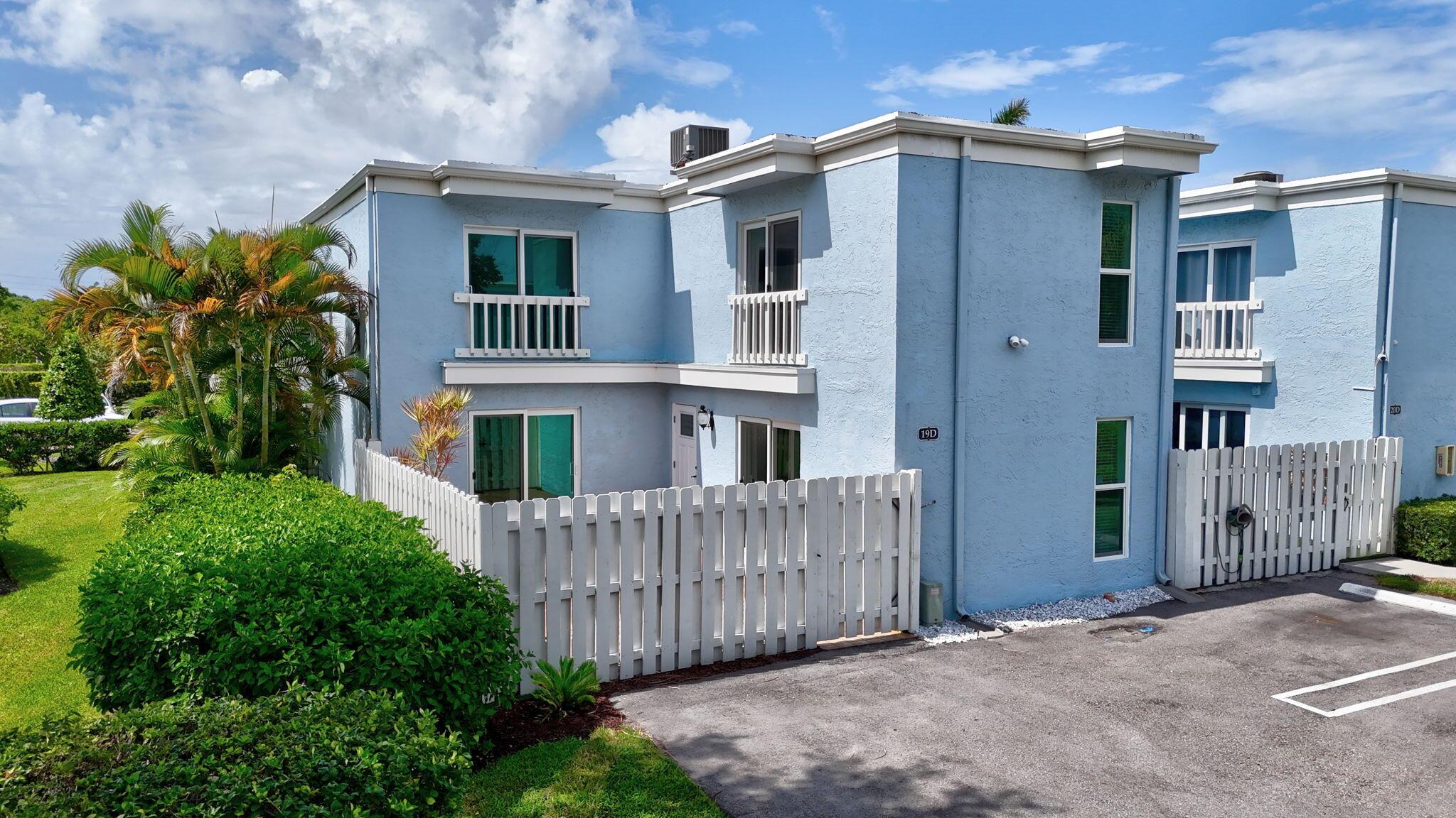 Welcome to Martel Arms, where coastal charm meets convenience in this rarely available 1,400 sq ft courtyard townhome. Ideally positioned with northeast exposure, this light-filled 2-bedroom, 2-bath residence is just a short walk to Delray's beautiful North End Beach and only one mile from the vibrant Atlantic Avenue.Tucked into a lush, private setting, this pet-friendly, golf cart-ready home offers the ultimate resort-style lifestyle with effortless access to top dining, shopping, cultural attractions, and major airports. Featuring brand new hurricane-impact windows and doors, fresh flooring--including real oak wood on the stairs--and recently removed popcorn ceilings, this move-in ready property is perfect as a vacation getaway or full-time residence.