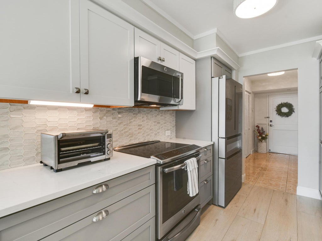 Photo of 3400 N OCEAN Drive #908, Singer Island, FL 33404 (MLS # B26073463)