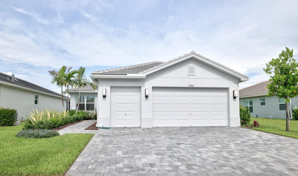Photo of 11886 SW Poseidon Way, Port Saint Lucie, FL 34987 (MLS # R11111468)