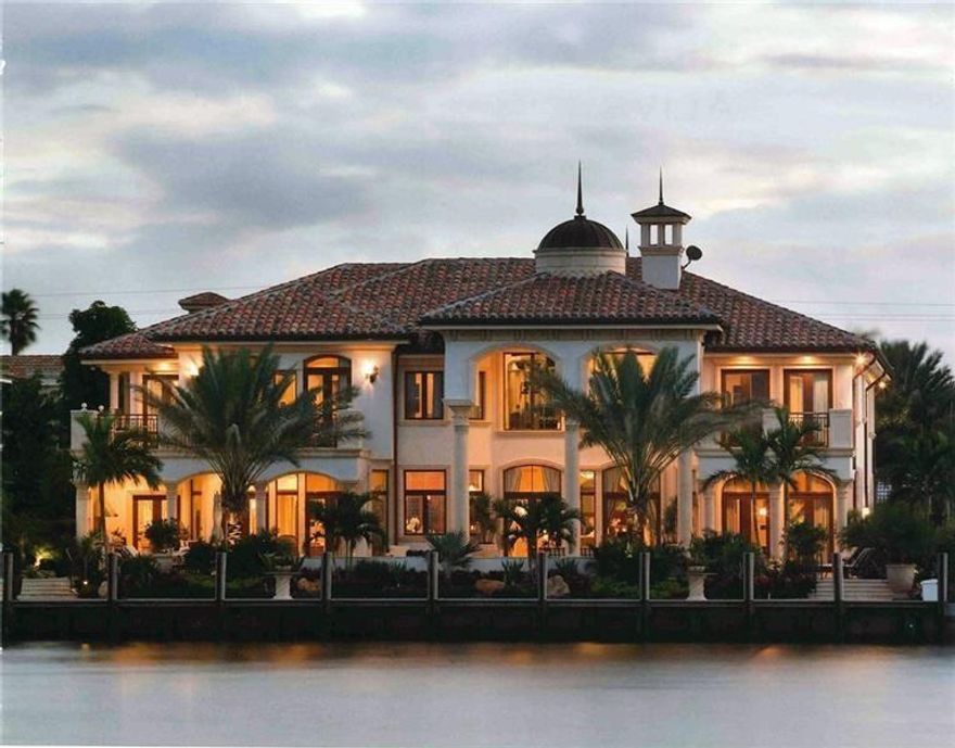 Spectacular location for open water views in this custom harbor Beach home. Exquisite updates in the home that make this residence stunning with exceptional interior design. Luxurious master suite, private sitting room, expansive master bath with huge dressing room. All guest suites are large and beautifully appointed each with private baths. Library, theatre, pool room, formal living and dining rooms, butlers pantry, wine cellar and family room open to gourmet kitchen. Gym on the second level overlooking beautiful water views. Inviting pool area with outside covered patio and summer kitchen. Furniture may be purchased. iMPECCABLY MAINTAINED AND NEVER LIVED IN FULL TIME.