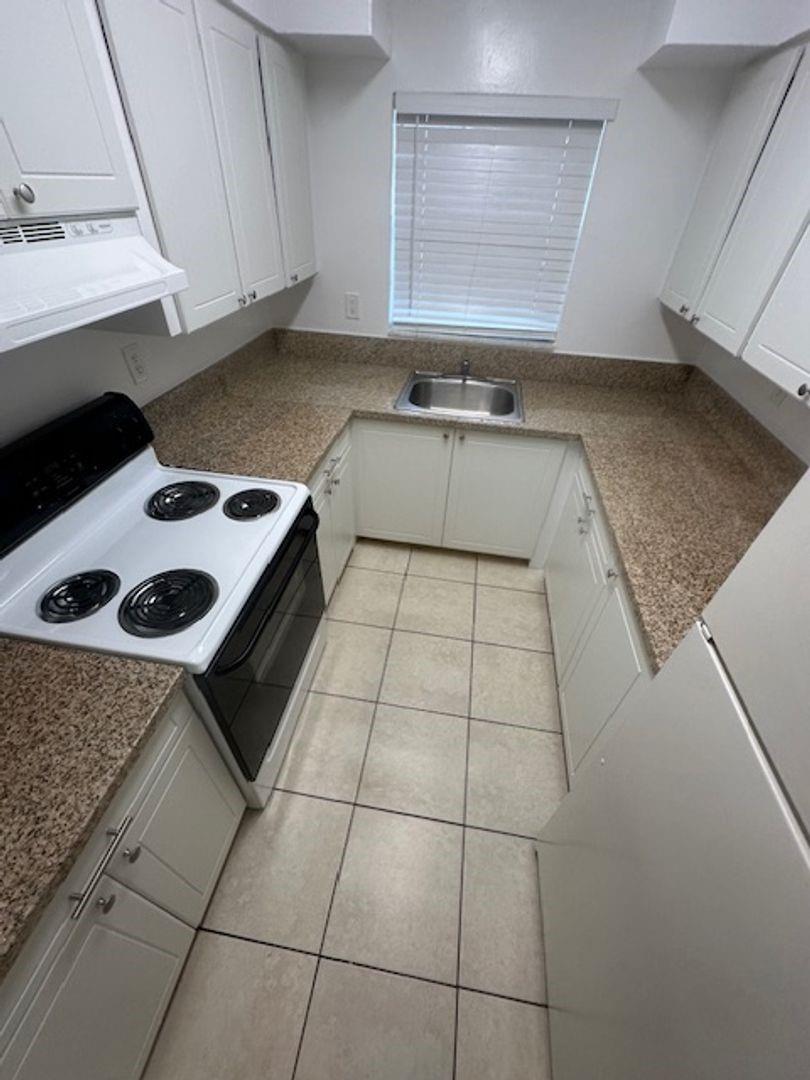 Welcome to this lovely ground floor 1 bedroom, 1 bathroom apartment located in Coral Springs, Florida. This cozy and inviting apartment is perfect for those who want to experience the relaxed coastal lifestyle of one of South Florida's most charming cities. The kitchen is fully equipped with a refrigerator and stove. Water, sewer, trash are included with rent.