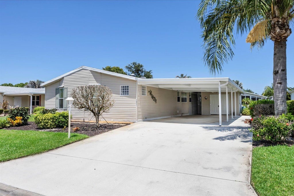 Photo of 2921 Eagles Nest Way, Port Saint Lucie, FL 34952 (MLS # B26044965)