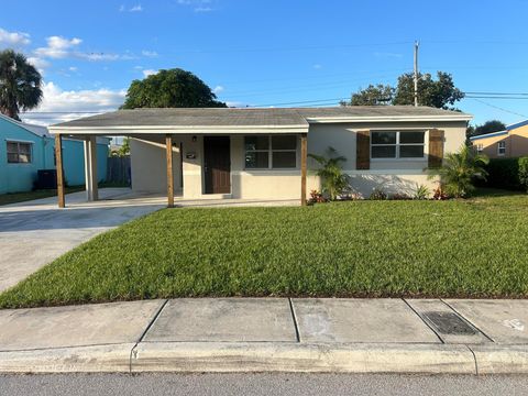 Photo of 1210 W 26th Court, Riviera Beach, FL 33404 (MLS # R11125118)