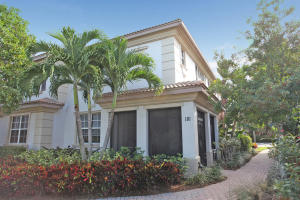 Stunning Town Home with Screened-In Front Porch & Gorgeous Lake Views. 2 Bed, 2.5 Bath + Open Loft /Office Area. Gorgeous Upgrades, Include; a Chefs Kitchen with Top Notch Appliances, Large Diagonal Tile Floors Downstairs, Plank Wood Floors Upstairs, Designer Window Treatments, Premium Light Fixtures & Ceiling Fans.