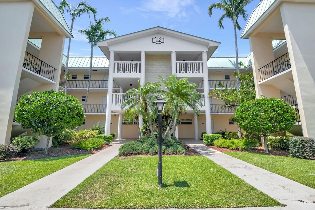 Photo of 12 Colonial Club Drive #301, Boynton Beach, FL 33435 (MLS # R11009897)