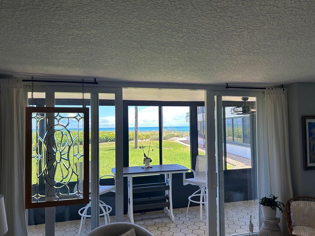 Photo of 1357 Ne Ocean Blvd #103, Stuart, FL 34996 (MLS # R10998949)