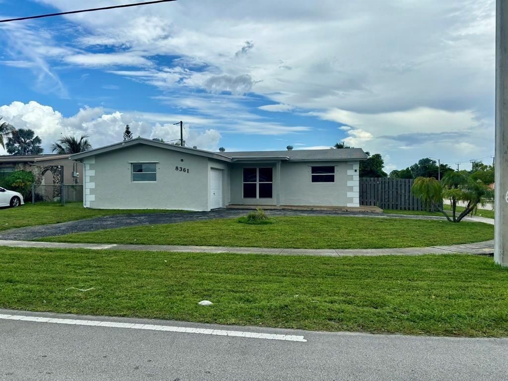 Photo of 8361 NW 27th Pl, Sunrise, FL 33322 (MLS # F10540236)