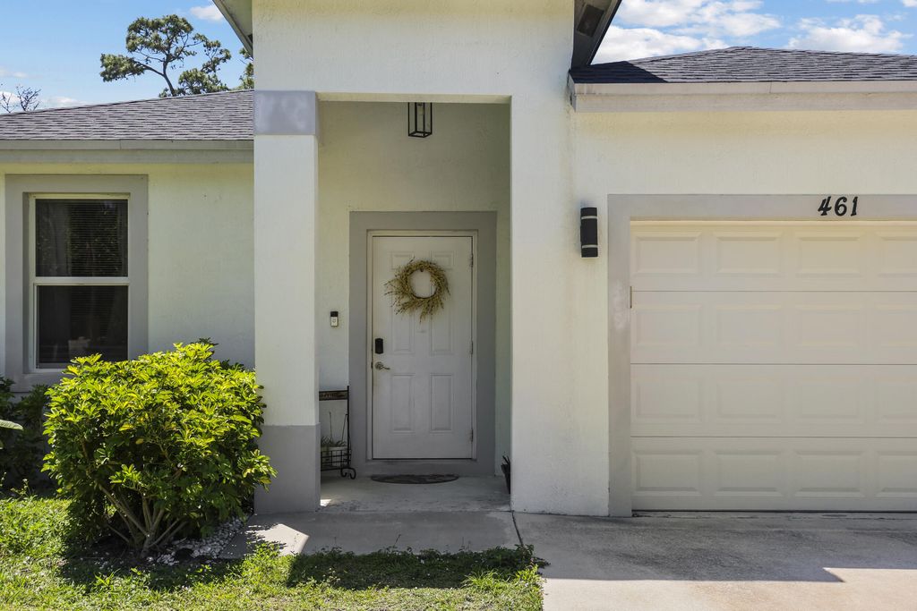 Photo of 461 Swain Boulevard, Greenacres, FL 33463 (MLS # B26022001)