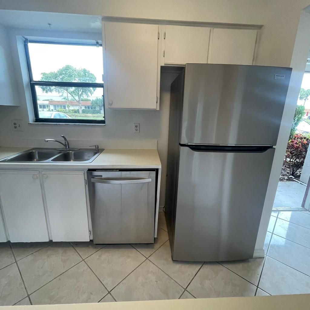 Photo of 2802 Canalside Drive, Greenacres, FL 33463 (MLS # R10943413)