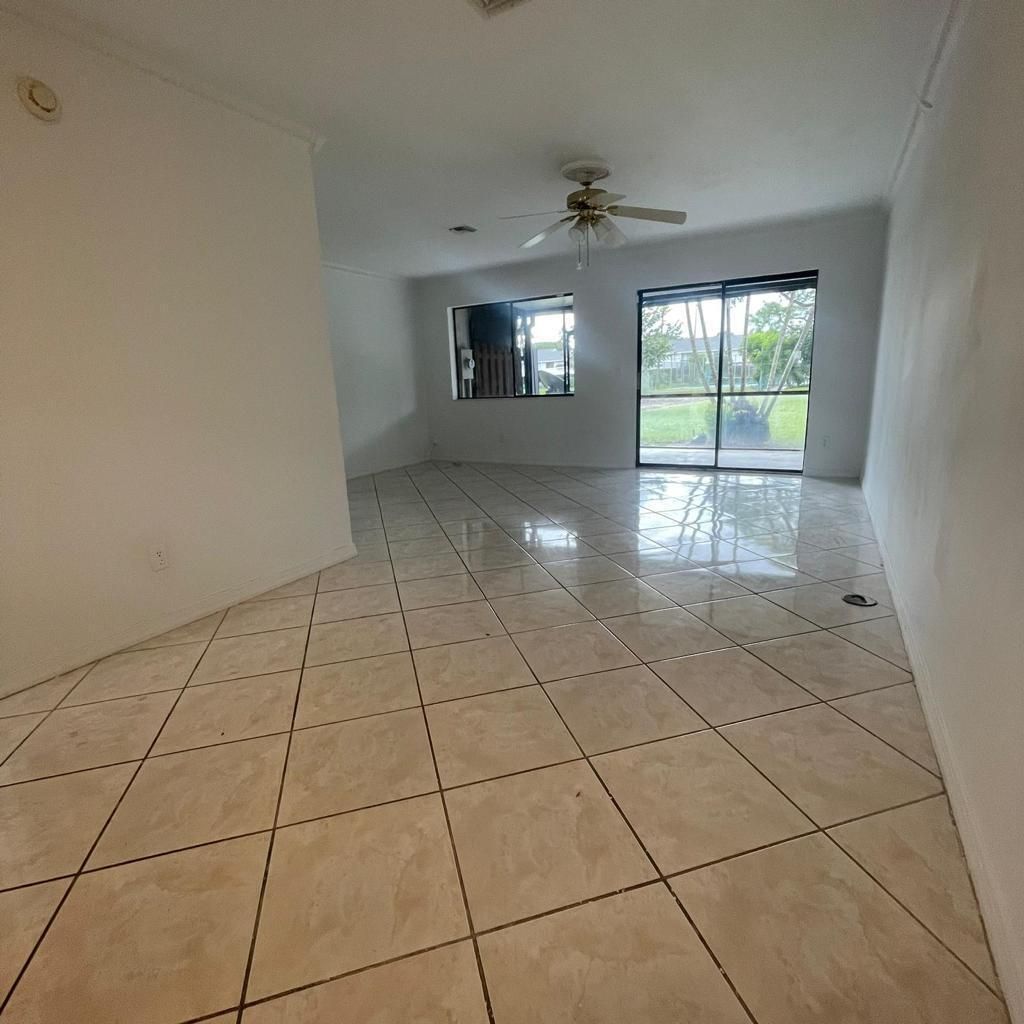 Photo of 2802 Canalside Drive, Greenacres, FL 33463 (MLS # R10943413)