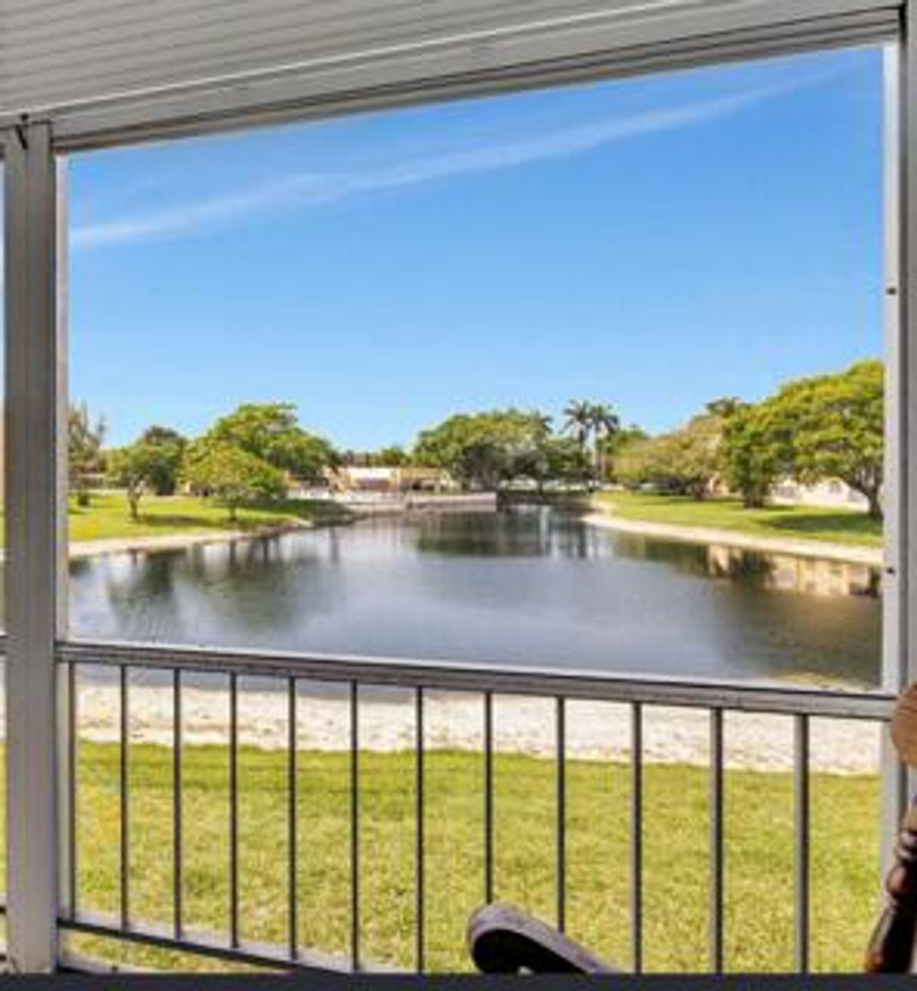 Photo of 5860 NW 64th Avenue #201, Tamarac, FL 33319 (MLS # B26032344)