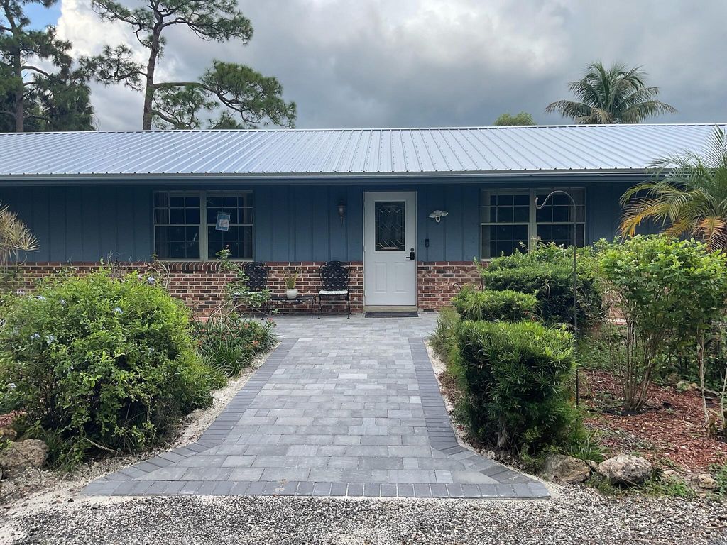 Photo of 3208 A Road, Loxahatchee Groves, FL 33470 (MLS # R11104904)